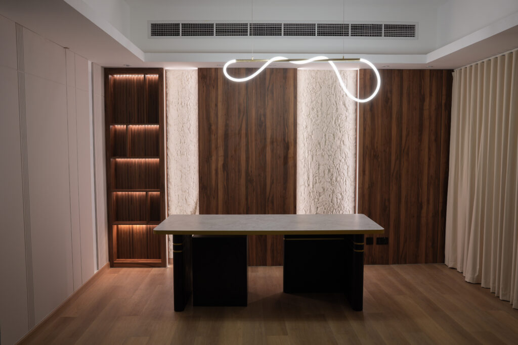 Premium studio interior with wood wall, desk and sculptural light